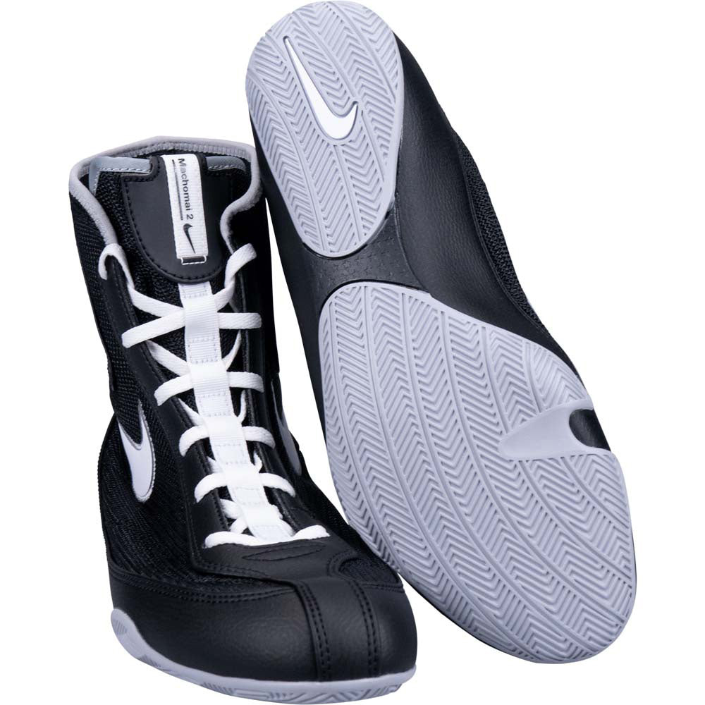 Black and white boxing shoes with Nike logo on a white background