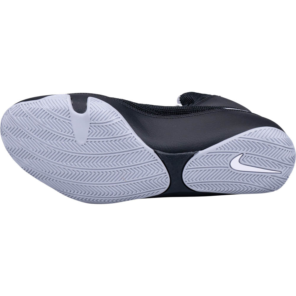Black and white Nike boxing shoes on a white background