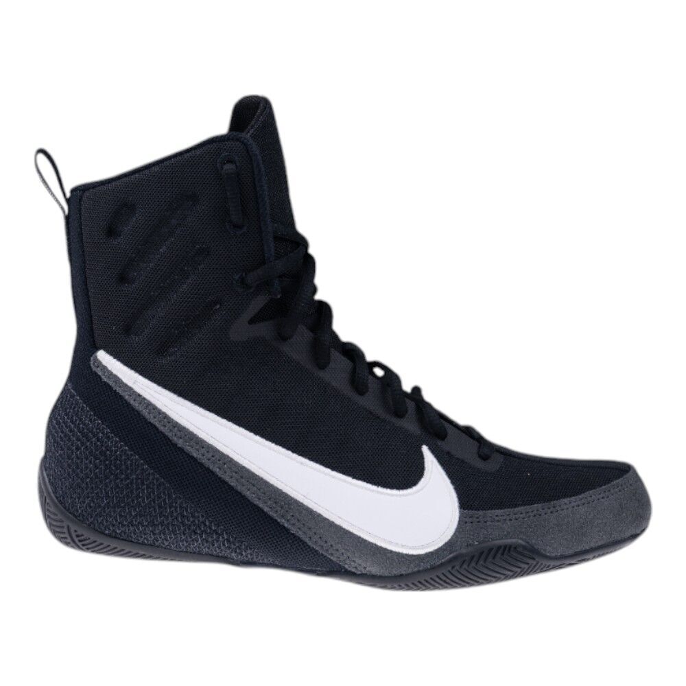Black high-top boxing sneaker with a white Nike logo on a white background