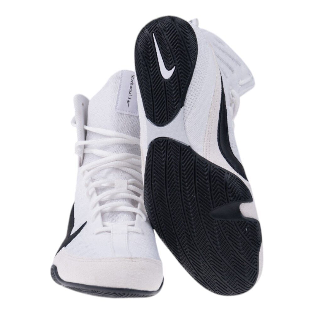 White and black basketball shoes with Nike logo on a white background