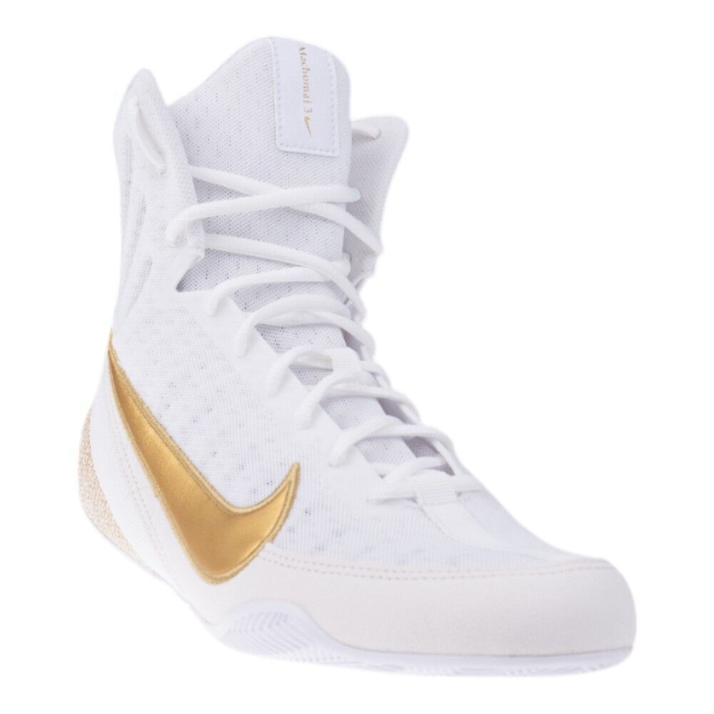 White high-top sneaker with gold swoosh logo on a white background