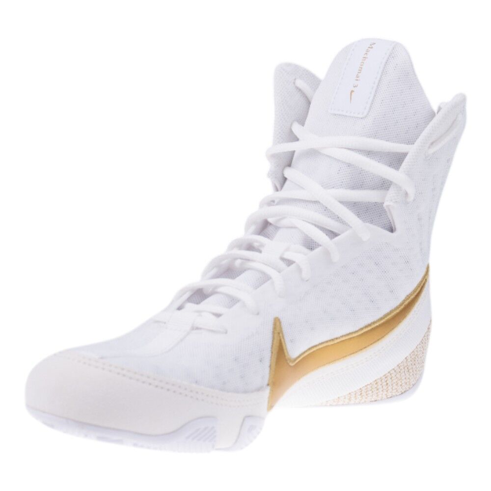 White Nike high-top sneaker with gold accents on a white background