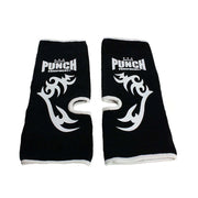 Black ankle guards with white tribal designs and 'Punch Equipment' branding on a white background