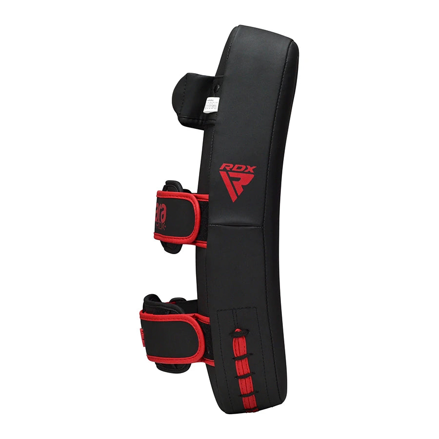 Black and red RDX thai pad on a white background
