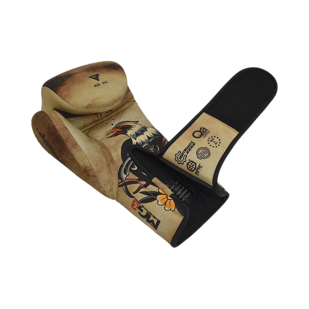 RDX boxing gloves with tattoo designs on a white background