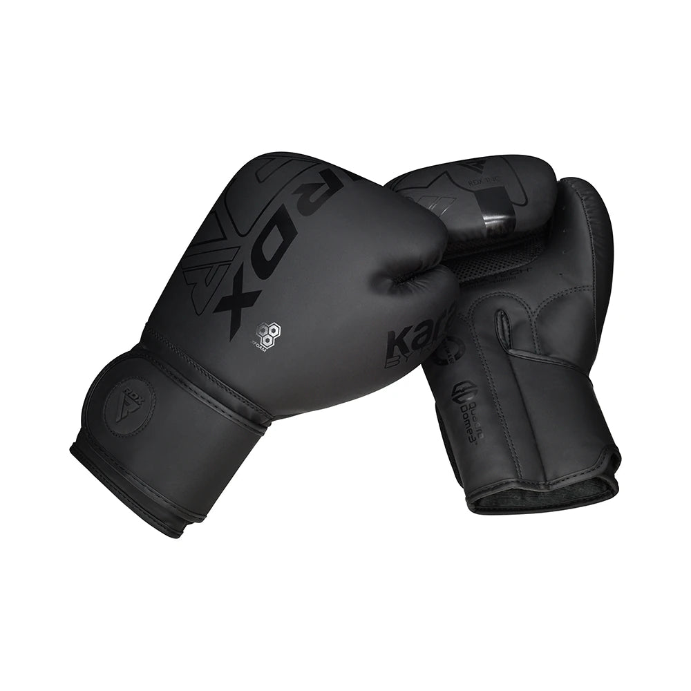 Black boxing gloves with 'RDX' branding on a white background