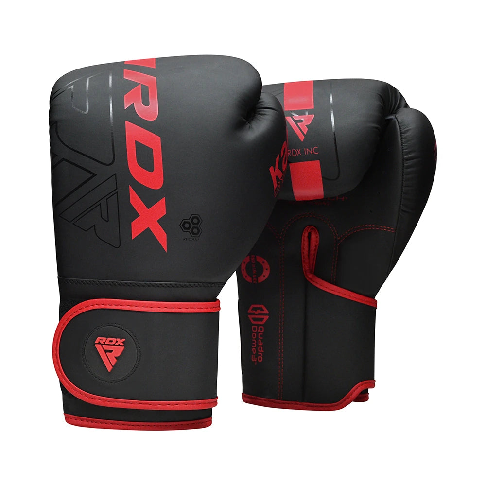 Black boxing gloves with red accents and RDX branding on a white background