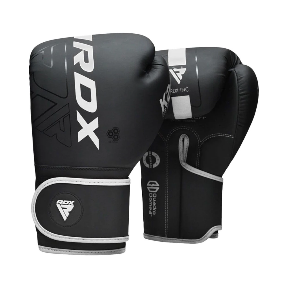 Black boxing gloves with RDX branding on a white background