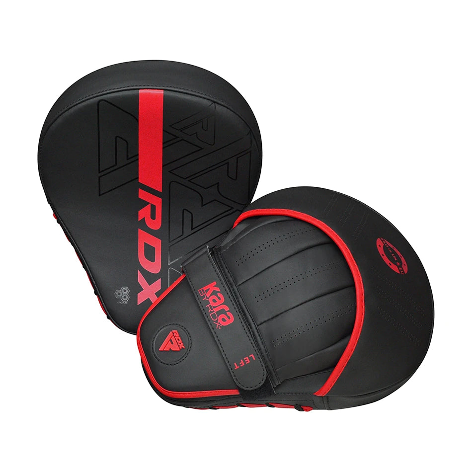 Black and red RDX boxing pads on a white background