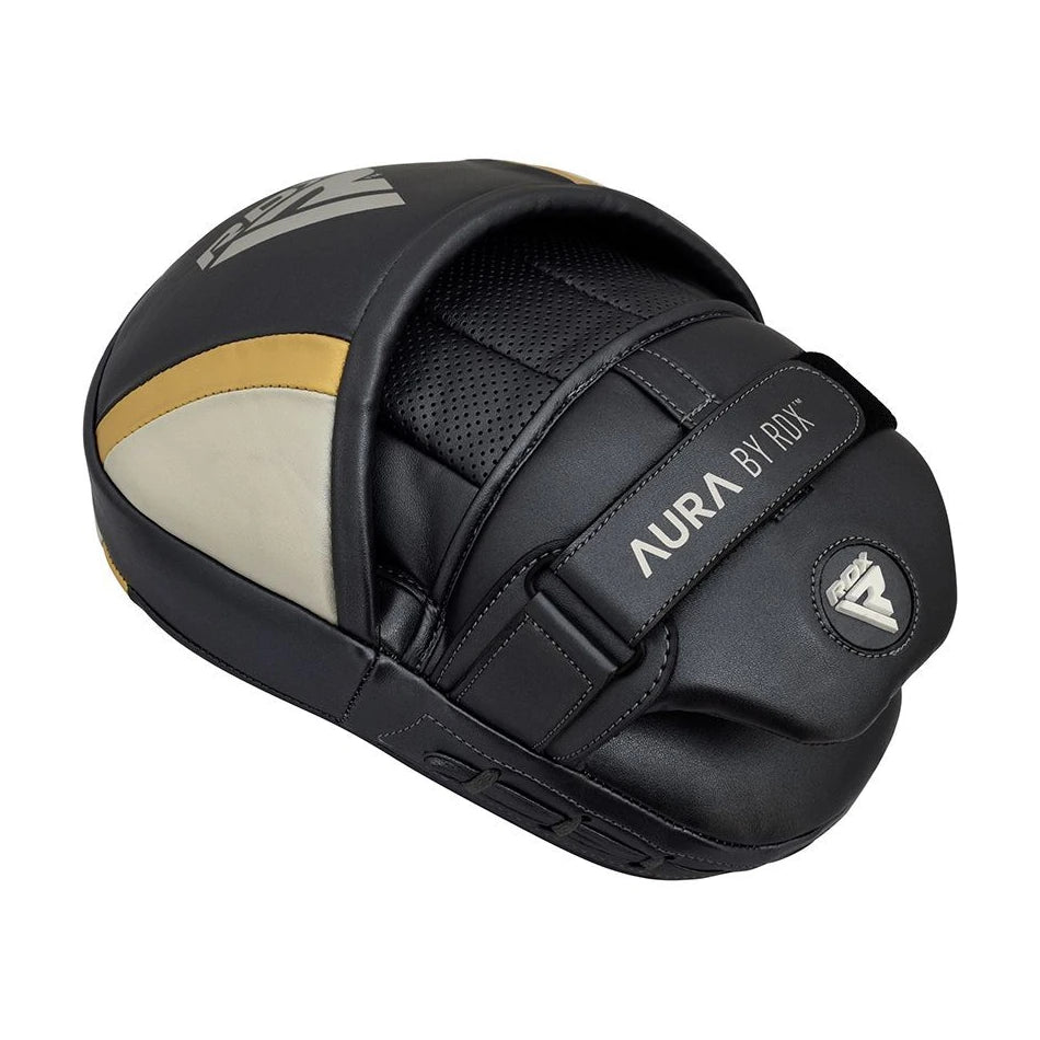 Black and gold training pad with 'Aura by RDX' branding on a white background