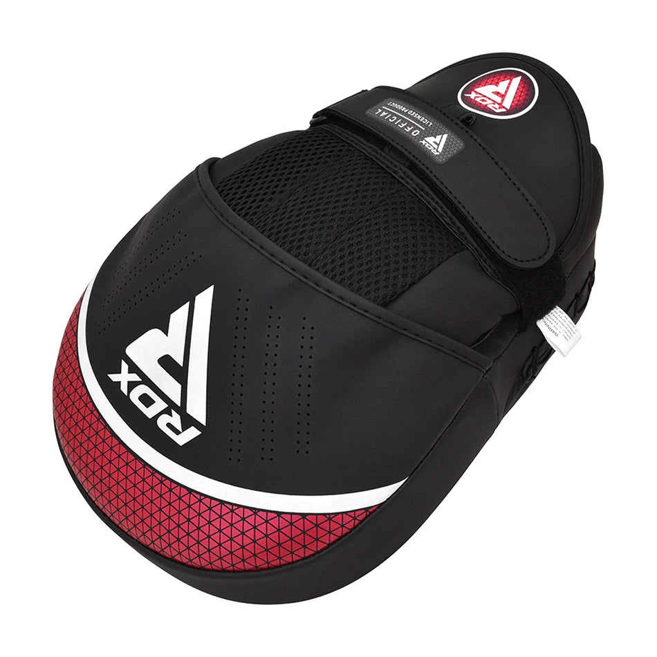 Black and red RDX boxing pad with visible branding on a white background