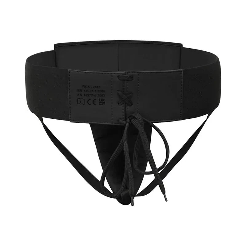 Black groin guard with adjustable straps on a white background