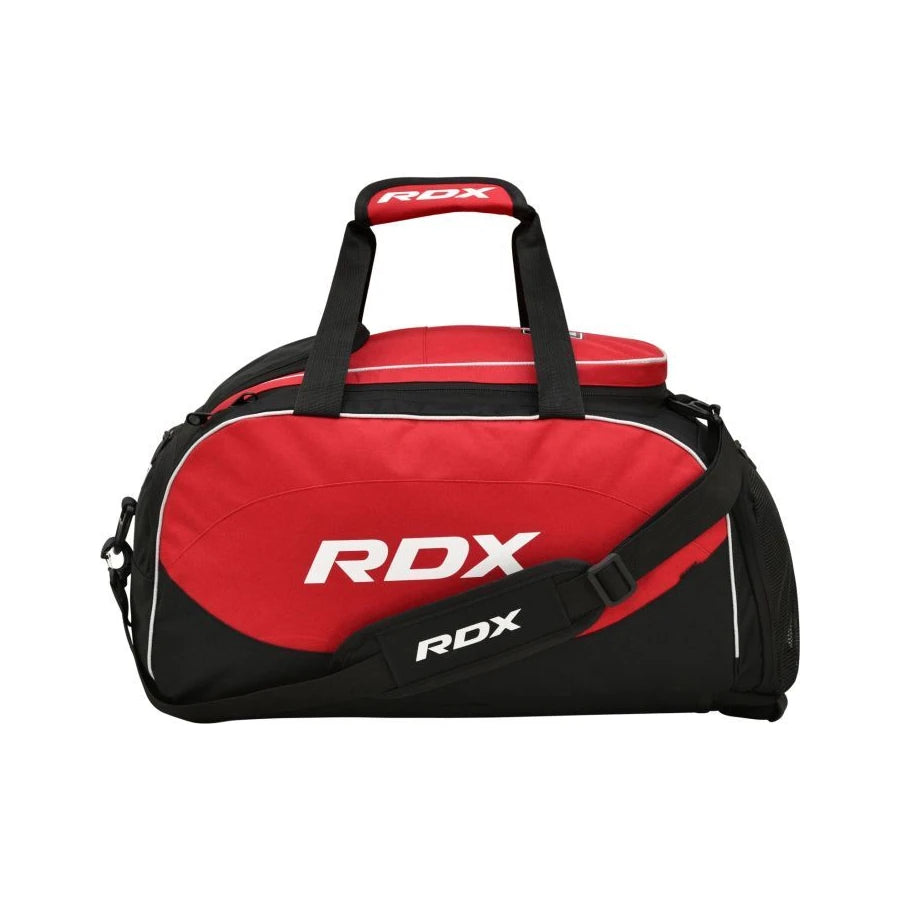 Red and black RDX duffel bag on a white background