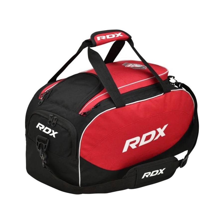 Red and black duffel bag with RDX branding on a white background