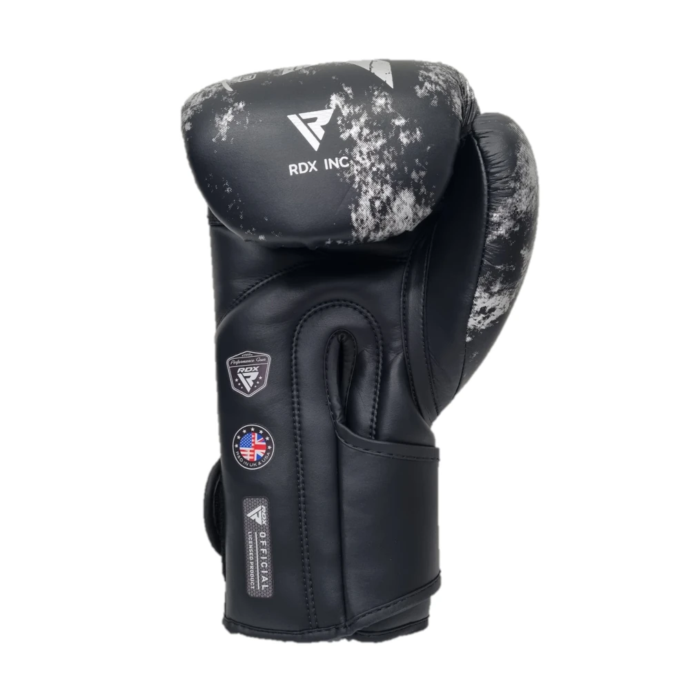 Black boxing glove with white speckles and visible branding on a white background