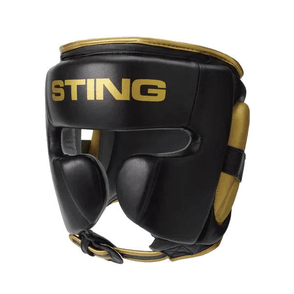 Black and gold boxing full face headgear with 'STING' branding on a white background