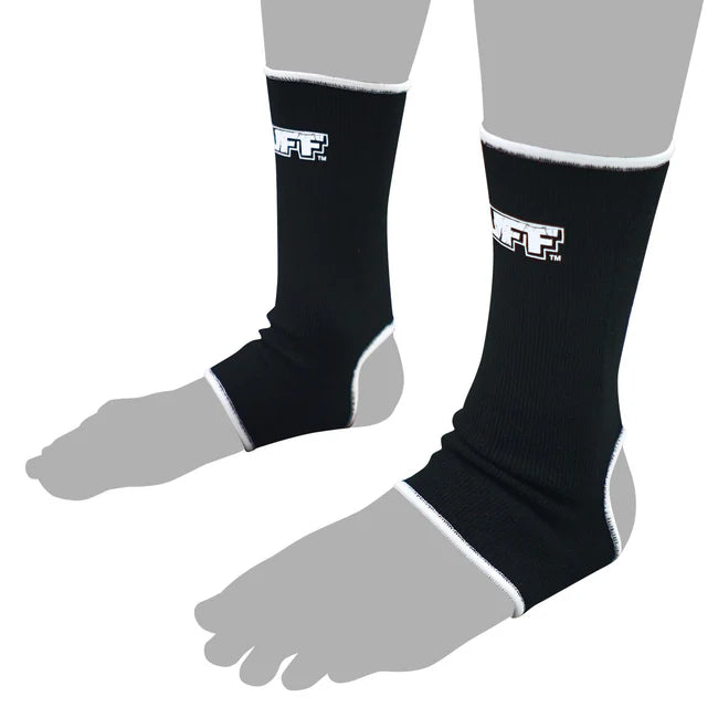 Black anklts with brand logo on a gray foot model background