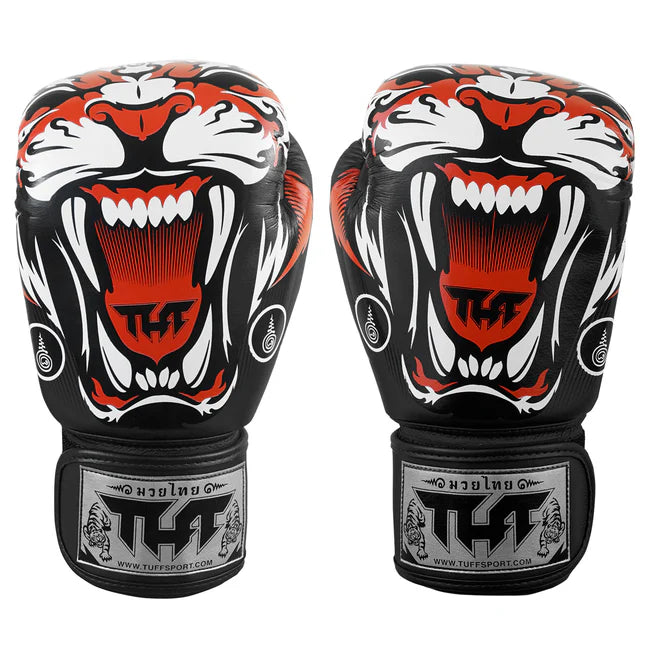 Pair of boxing gloves with a tiger design on a white background