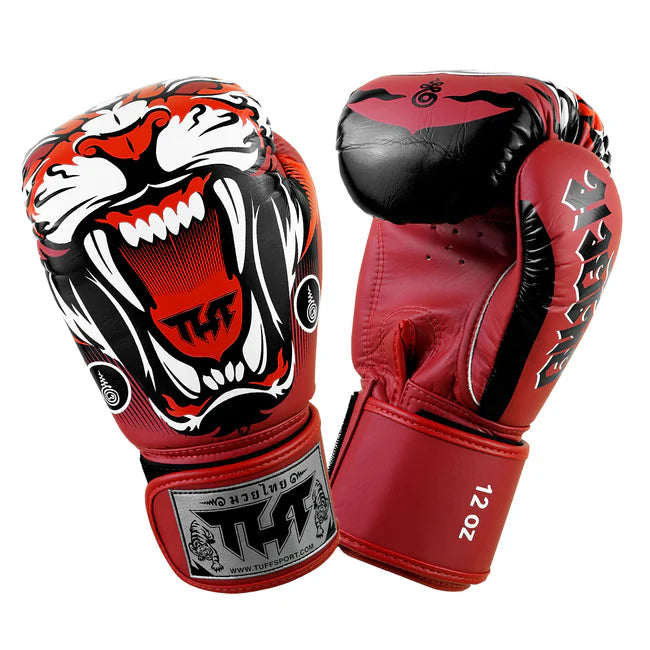 Red boxing gloves with a tiger design on a white background