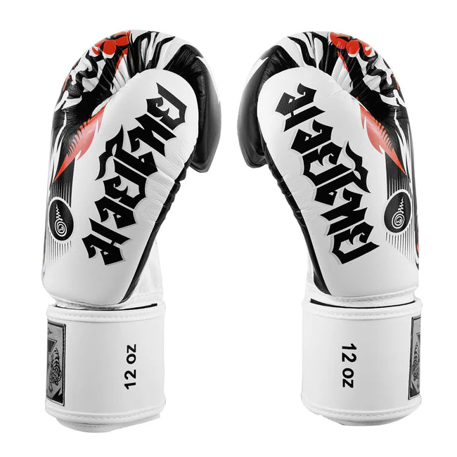 Pair of boxing gloves with black and red design on a white background