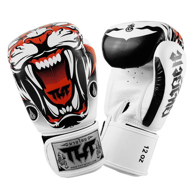 Pair of boxing gloves with a fierce animal design on a white background