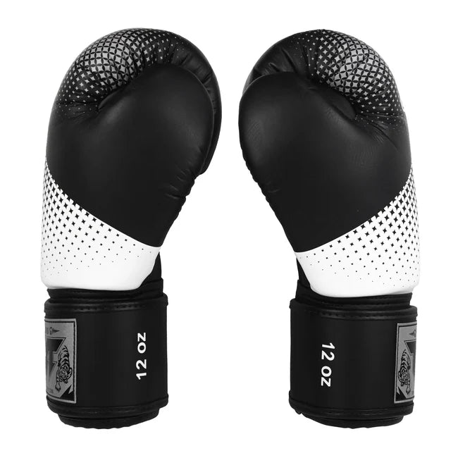 Pair of black and white boxing gloves with '12 oz' marking on a white background