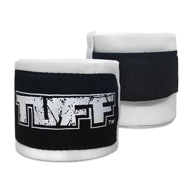 Pair of black and white wrist wraps with 'TUFF' branding on a white background