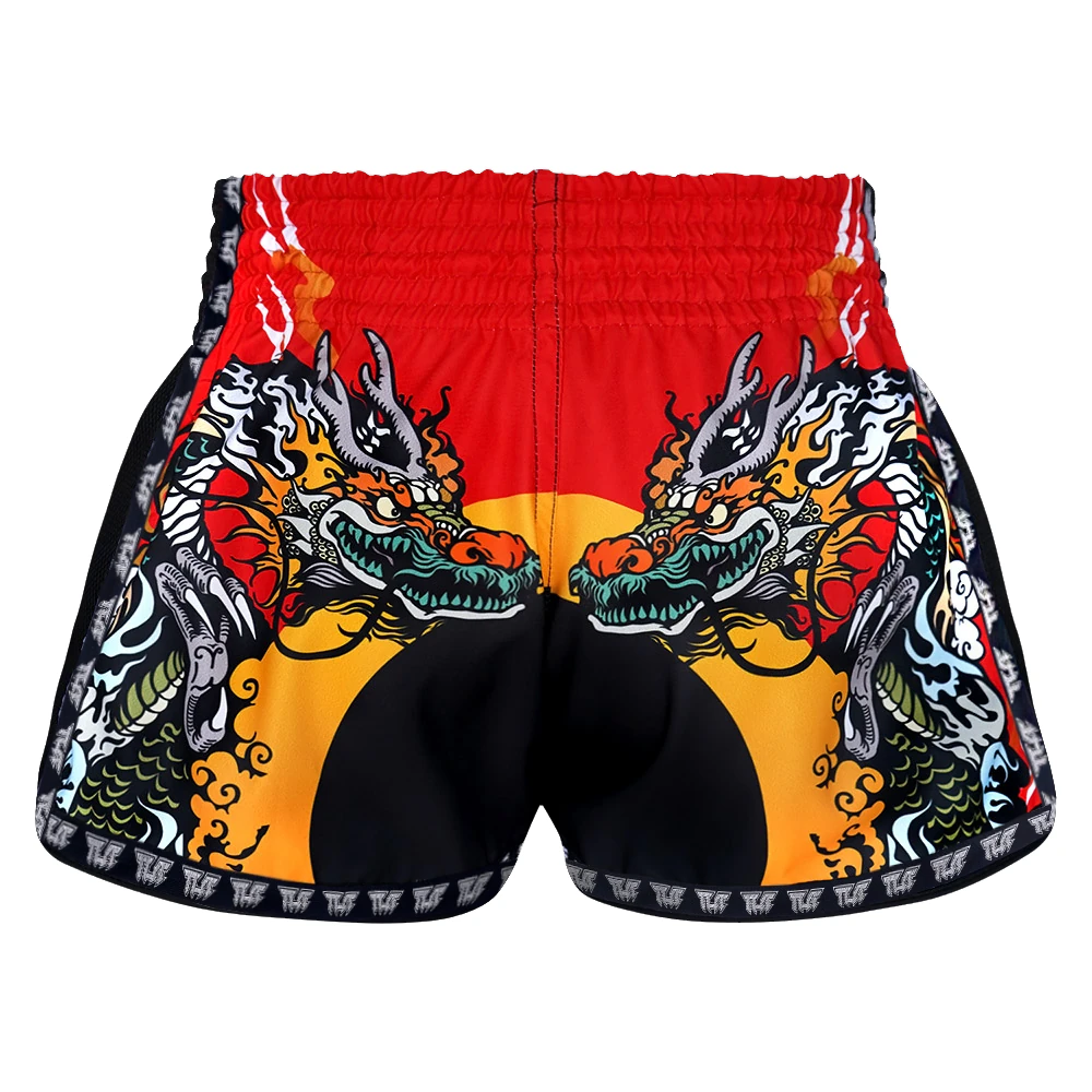 Colorful Muay Thai shorts with dragon design on a white background