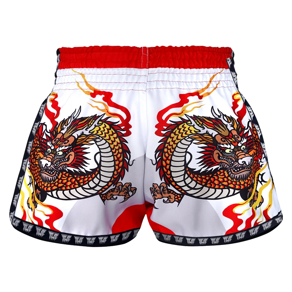 White Muay Thai shorts with red waistband and dragon design on a white background