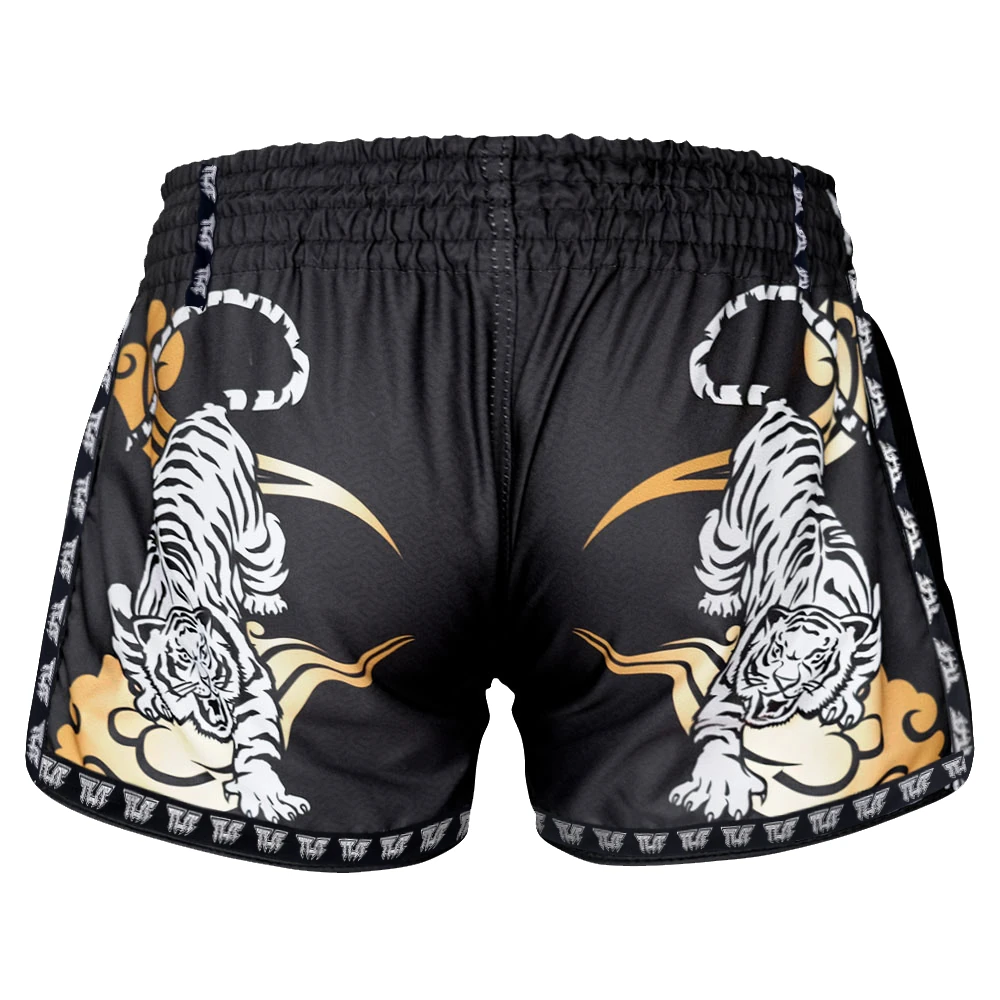 Black Muay Thai shorts with white tiger design on a white background