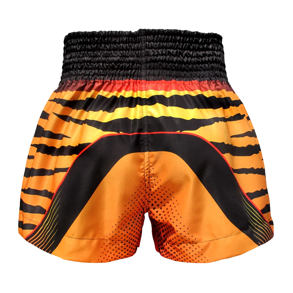 Orange and black striped Muay Thai shorts with a patterned design on a white background