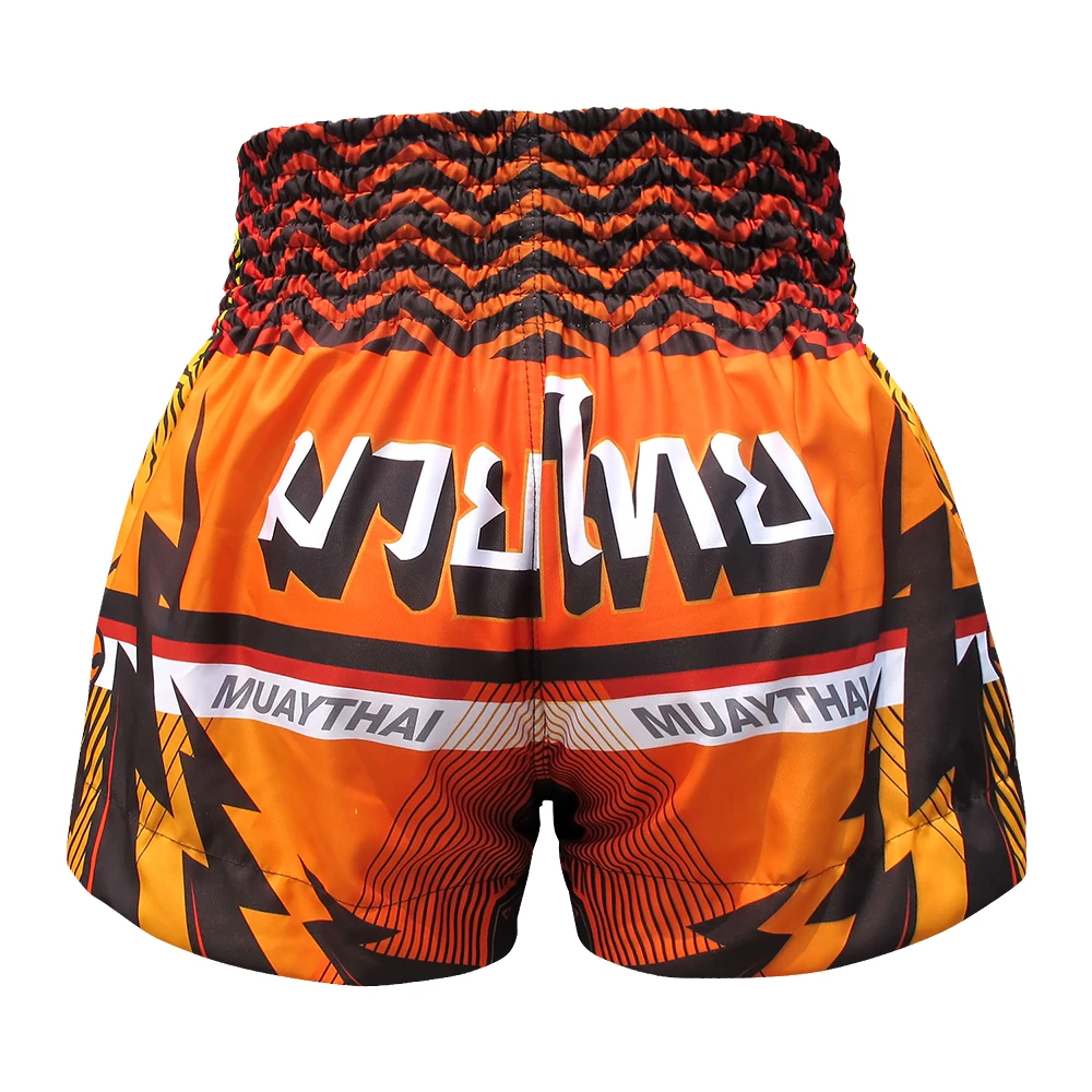 Orange and black Muay Thai shorts with white text on a white background