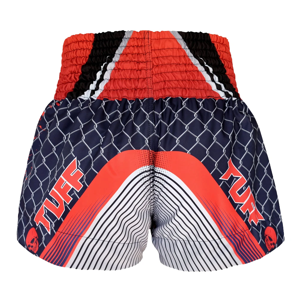 Muay Thai shorts with red and black design on a white background
