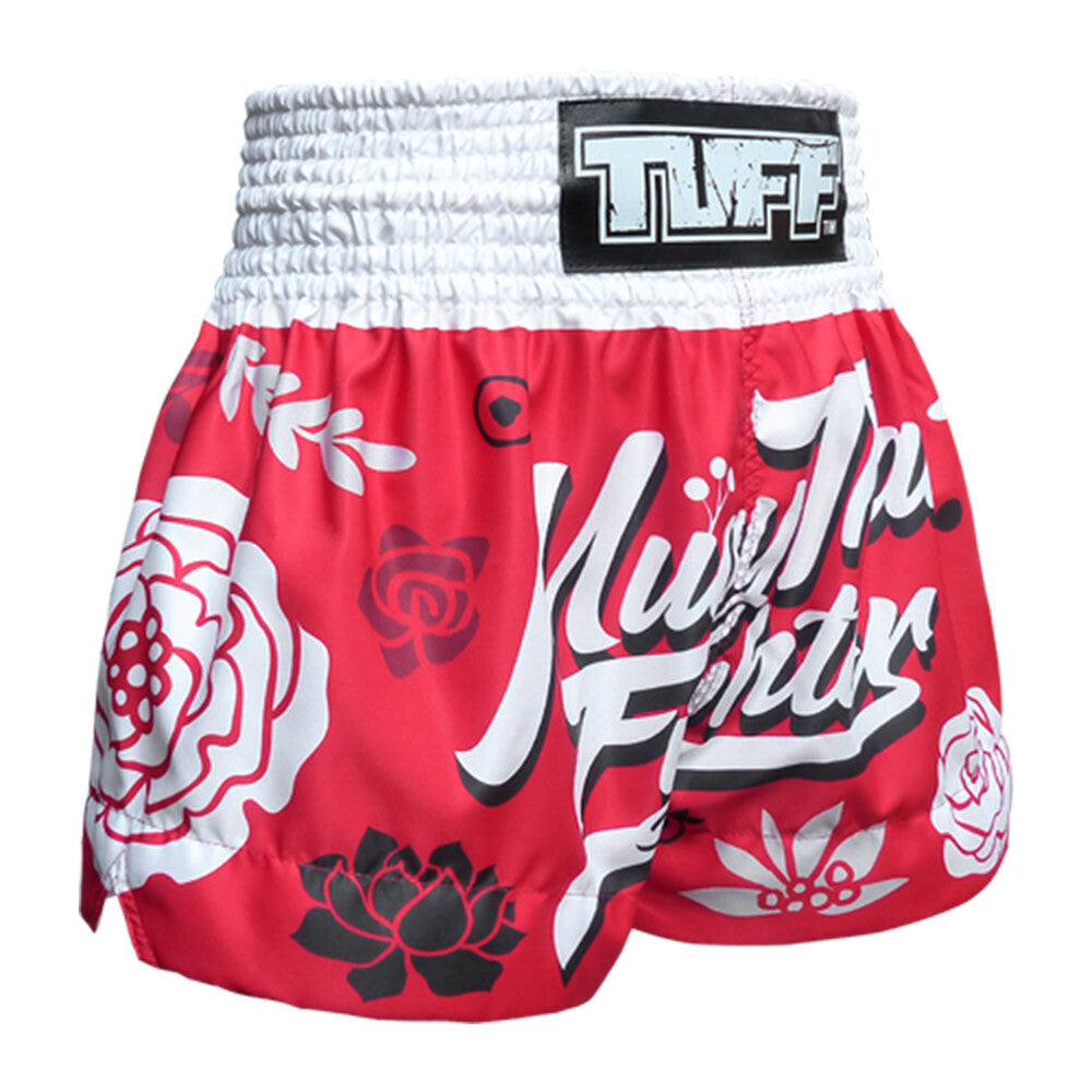 Red and white floral-patterned Muay Thai shorts with 'TUFF' branding on a white background