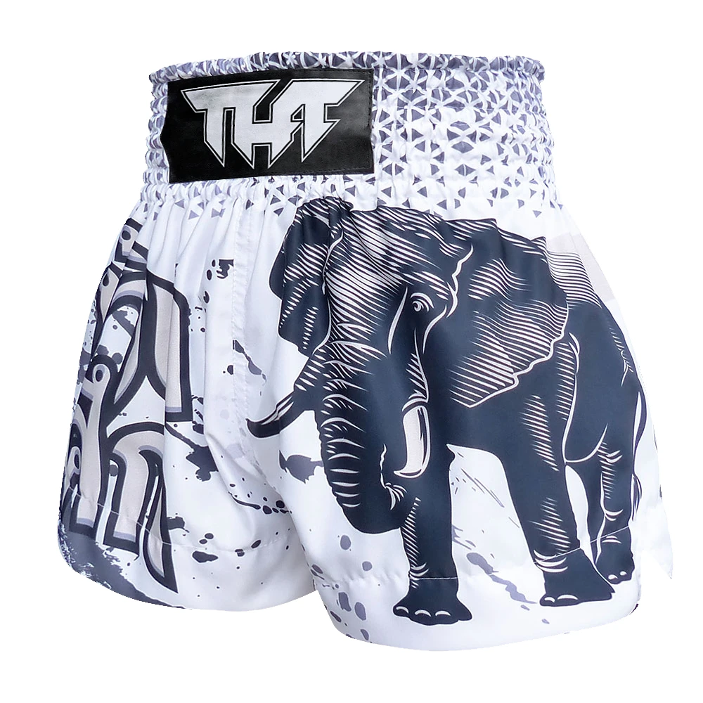 White Muay Thai shorts with elephant design and THF logo on a white background