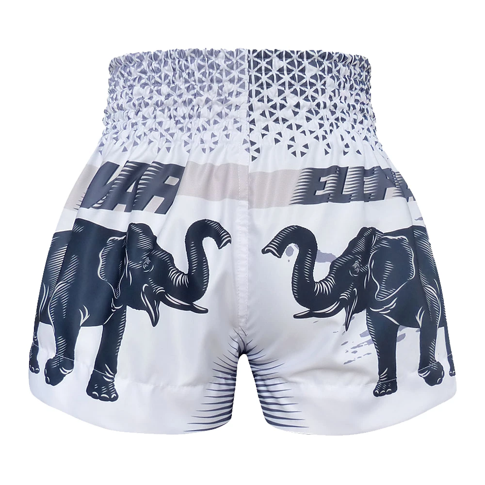 White Muay Thai shorts with black elephant designs on a white background