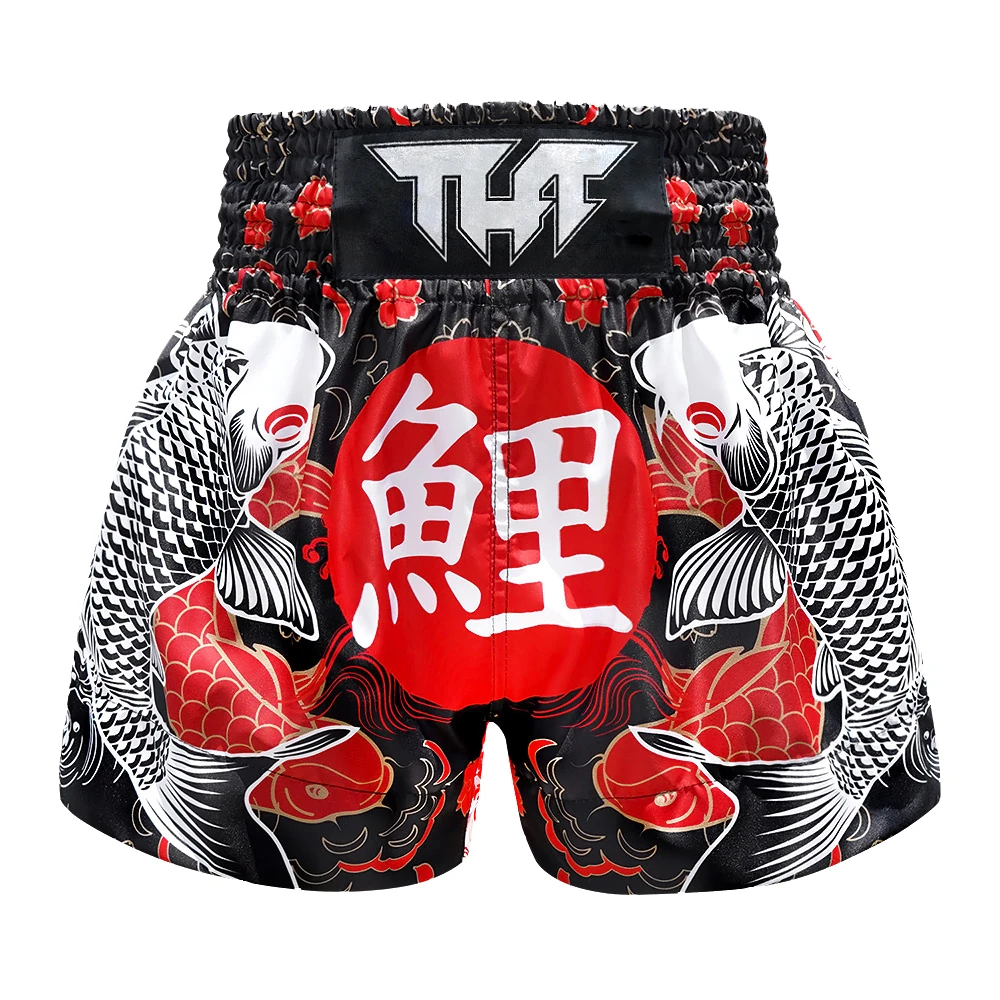 Black thai boxing shorts with red and white fish design and 'Tuff' logo on a white background