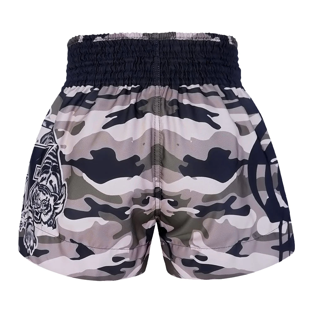 Camouflage thai shorts with a tiger design on a white background