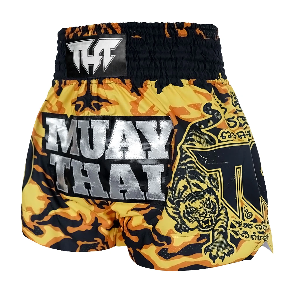 Muay Thai shorts with tiger design and 'Tuff' branding on a white background