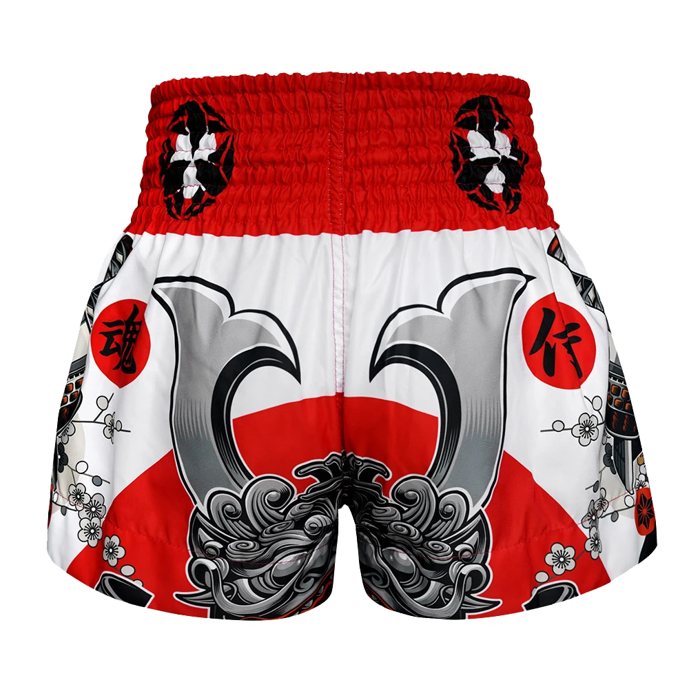 Traditional Japanese inspired Muay Thai shorts with red, white, and black design on a white background