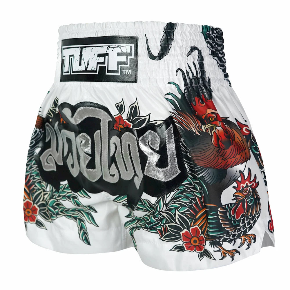 White Muay Thai shorts with rooster design and TUFF logo on a white background
