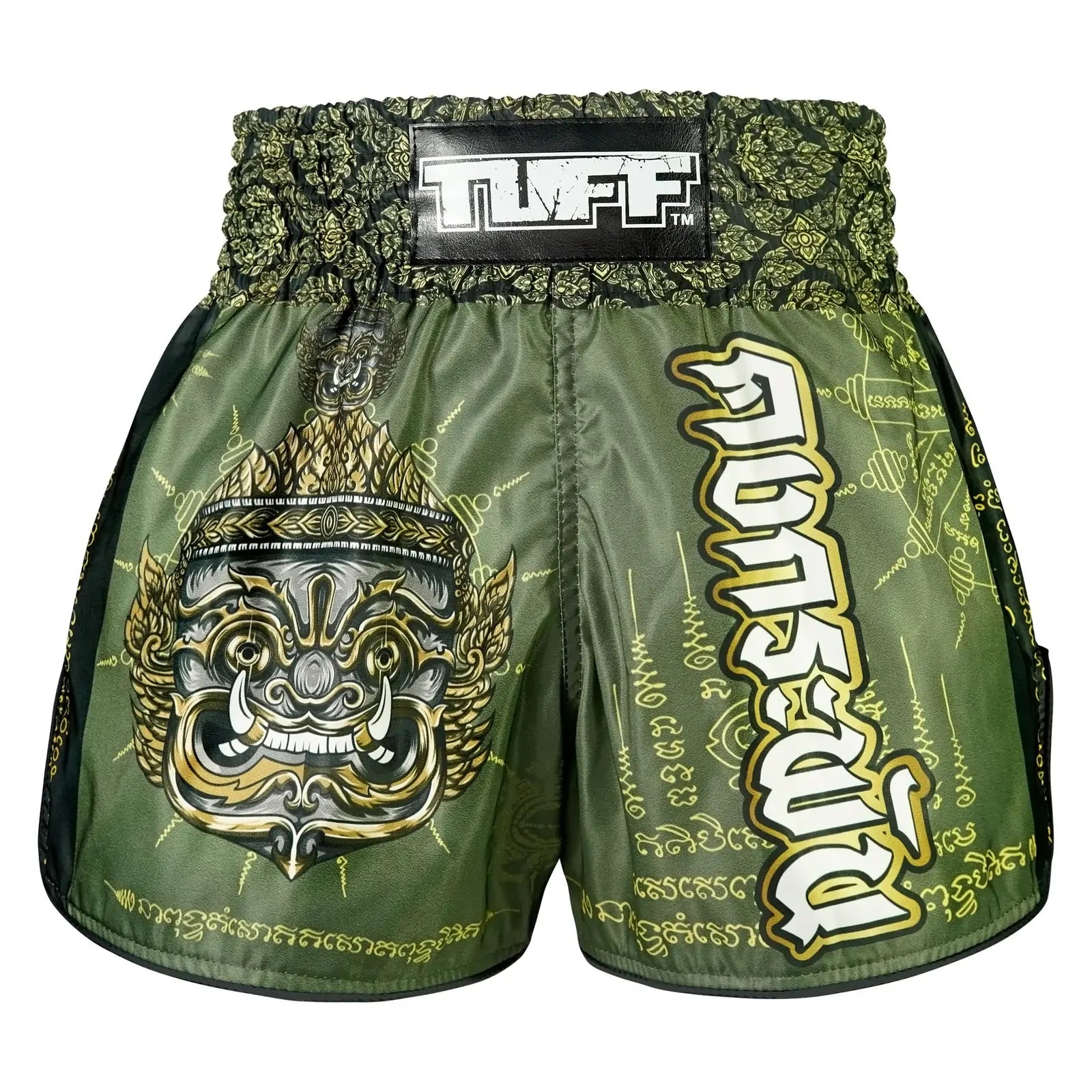 Green Muay Thai shorts with gold designs and 'TUFF' branding on a white background