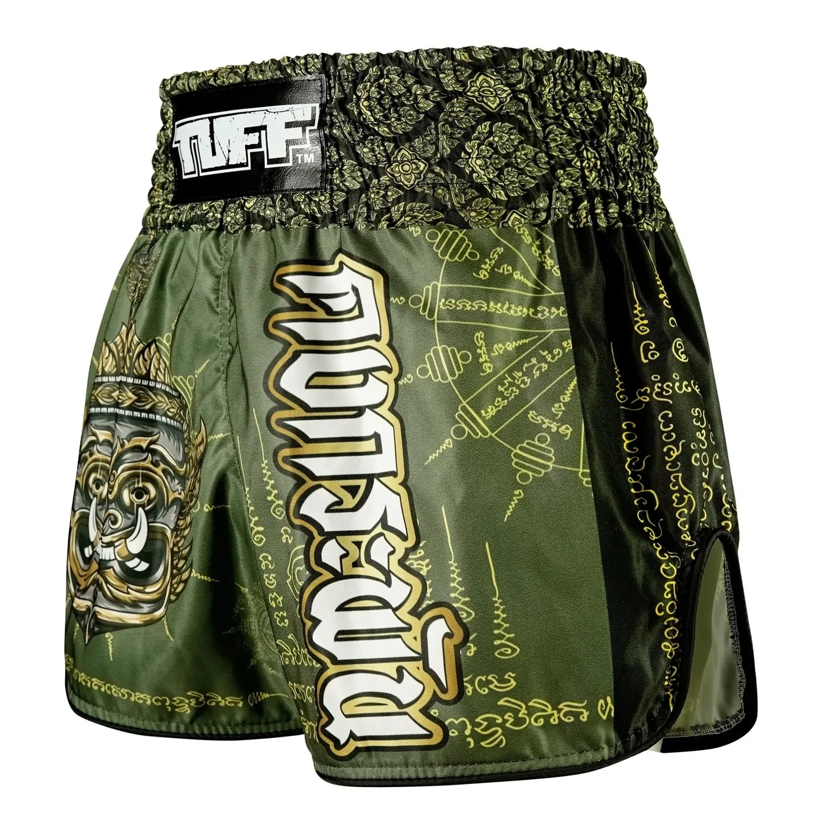 Green Muay Thai boxing shorts with intricate designs and 'TUFF' branding on a white background