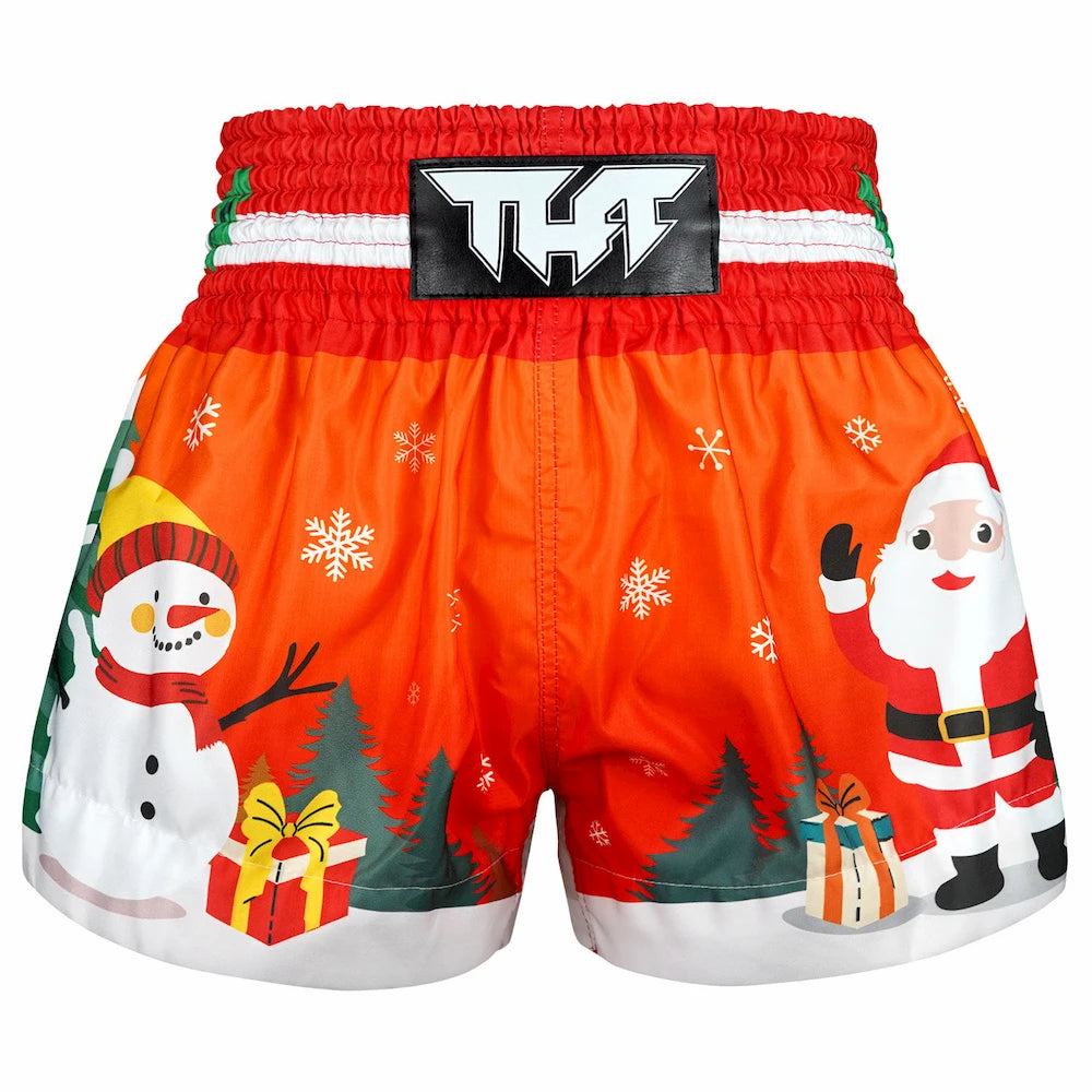 Christmas-themed Muay Thai boxing shorts with Santa Claus and snowman design on a white background