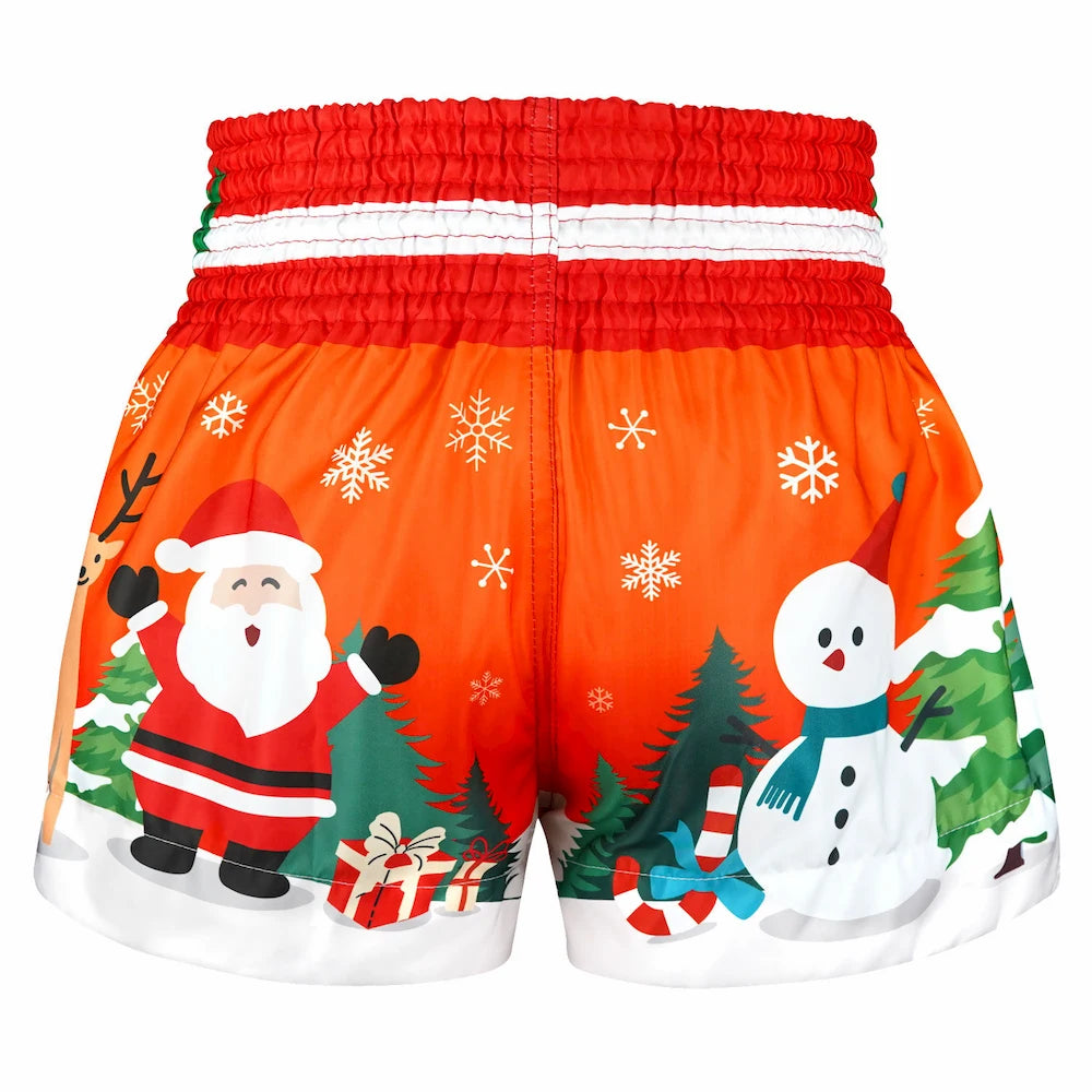 Christmas-themed Muay Thai shorts with Santa Claus and snowman designs on an orange background.