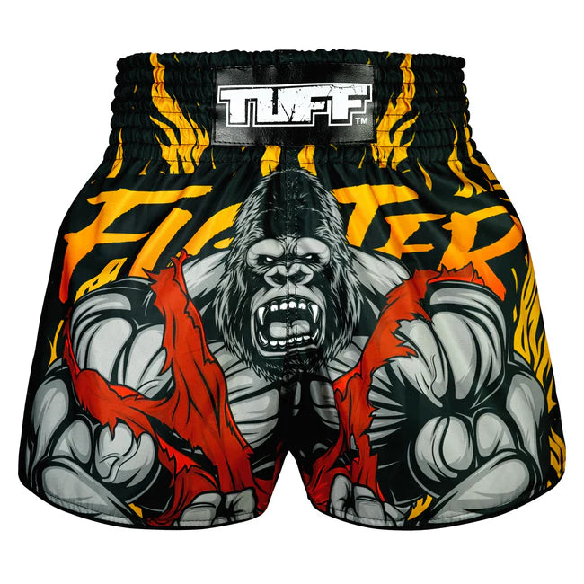 Black Muay Thai shorts with a gorilla design and 'TUFF' branding on a white background