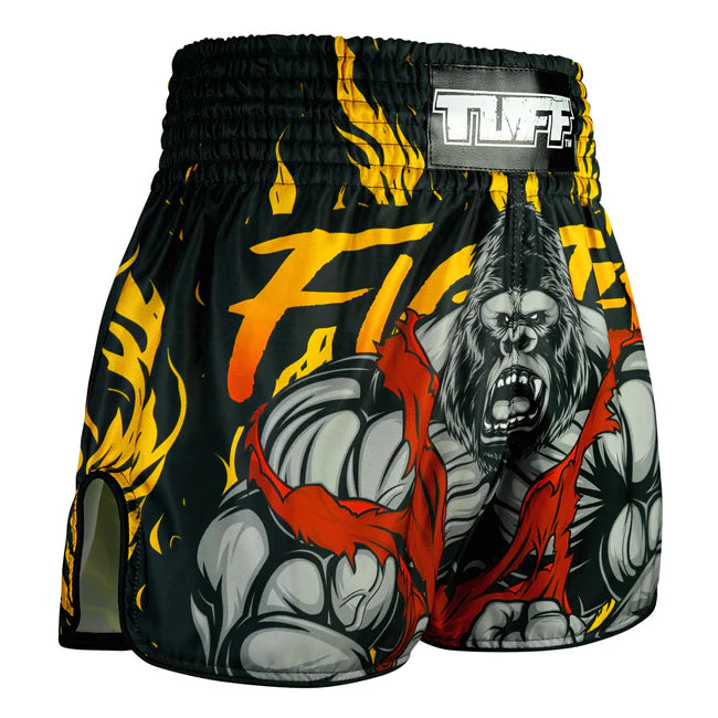 Thai shorts with a gorilla design and flames on a black background, featuring the brand 'TUFF'.