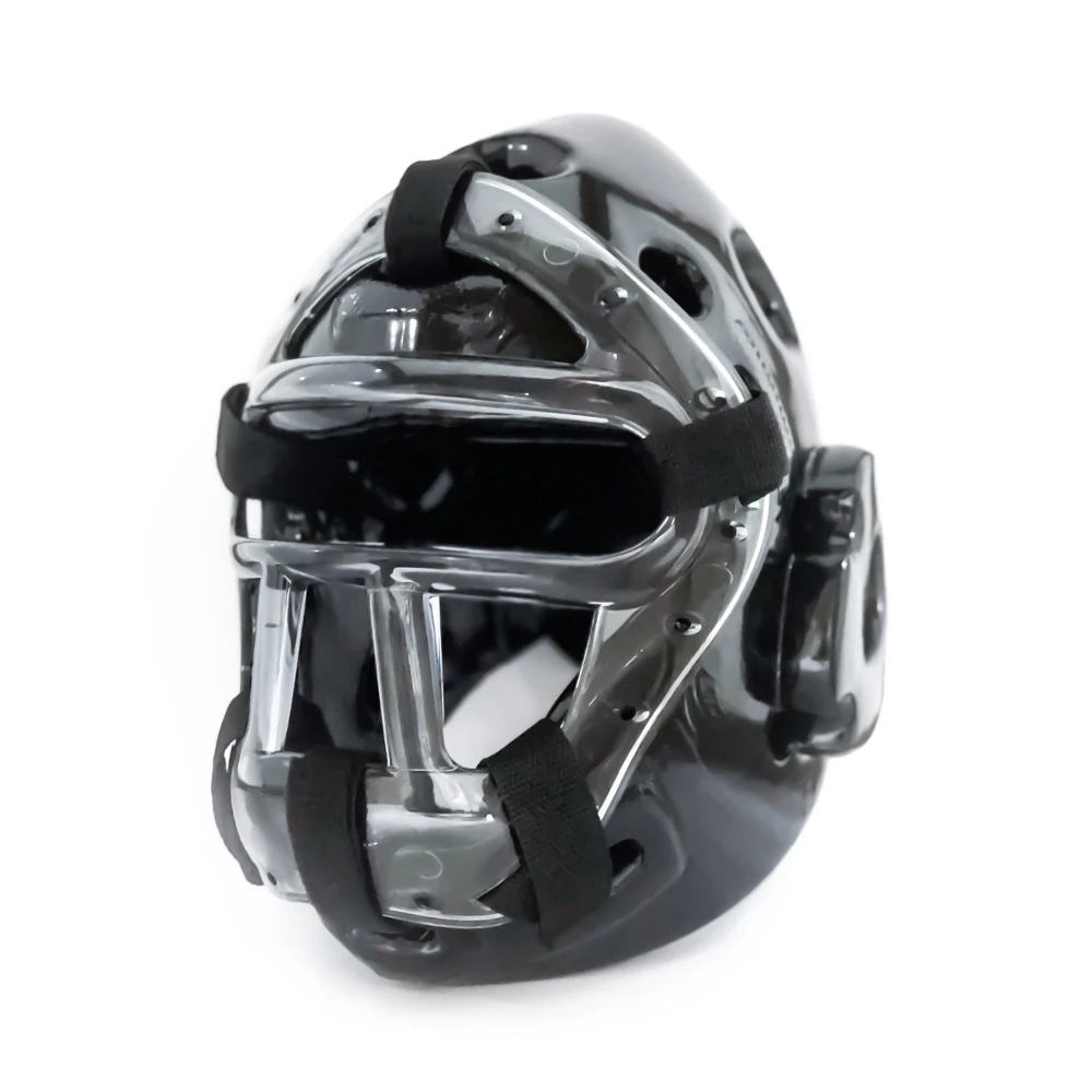 Black martial arts helmet with a clear face grill on a white background