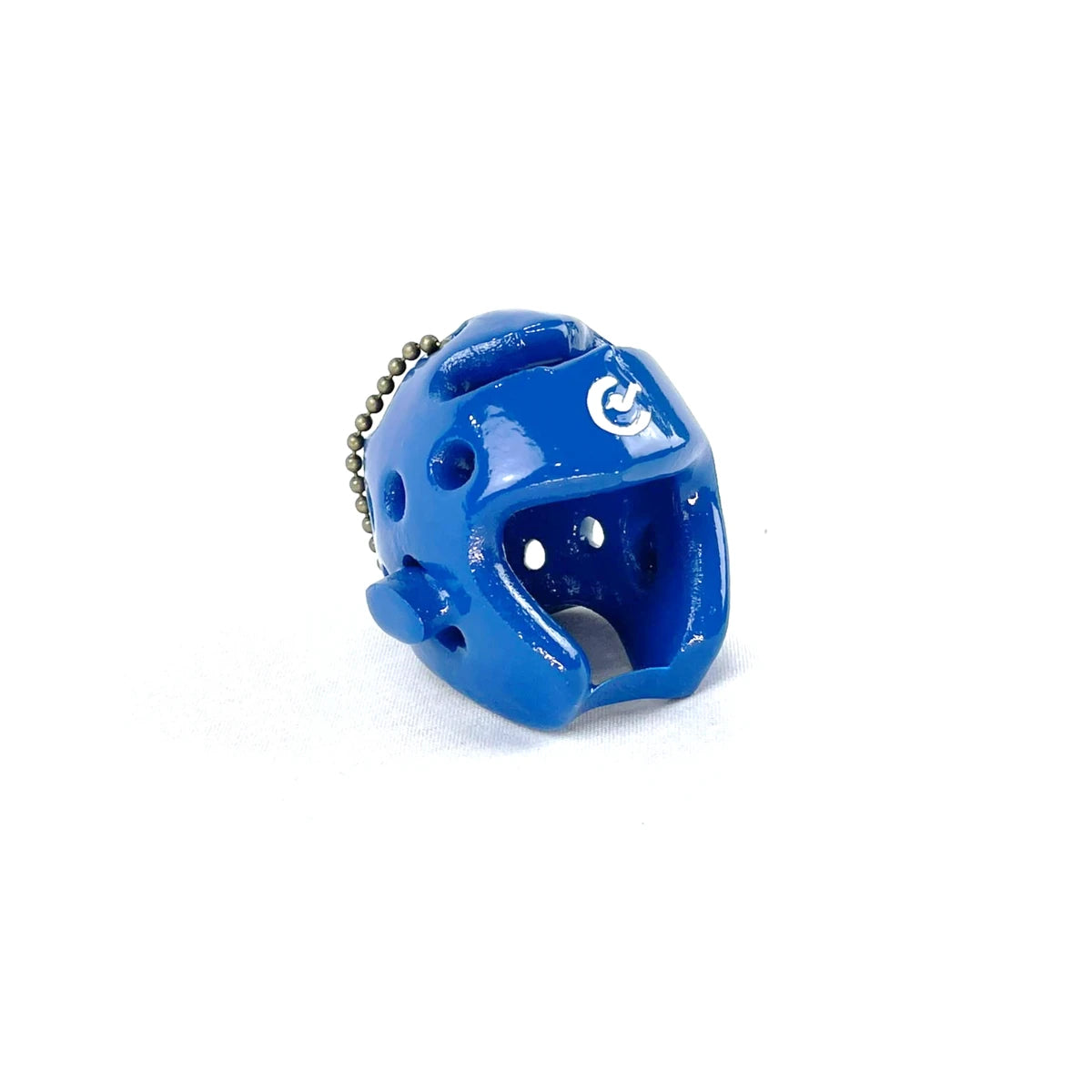 Blue taekwondo helmet keyring on a white background
