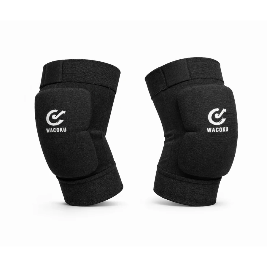 Pair of black knee pads with WACOKU branding on a white background
